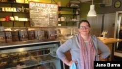 Anna Landmark’s business has transformed from being a retail shop and cheese facility to headquarters for collecting, packing and distributing locally made foods to deliver to customers in two counties, Madison, Wisconsin.