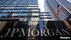 A JP Morgan Chase & Co sign is seen outside of the bank's headquarters in New York.