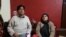 The family of jailed photojournalist Manan Gulzar Dar, pictured at the family's home in the Batamaloo locality of Srinagar in Kashmir. (Bilal Hussein/VOA)