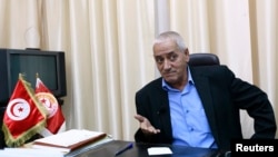 Hussein Abassi, head of Tunisia's UGTT union federation, speaks during an interview with Reuters in Tunis, Aug. 16, 2013. 