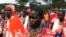 FILE - Kenyan Maasai women gather during a meeting dedicated to the practice of female genital mutilation (FGM) in which several participants voiced opposition to a ban currently in place, June 12, 2014, in Enkorika, Kajiado, 75km from Nairobi. 