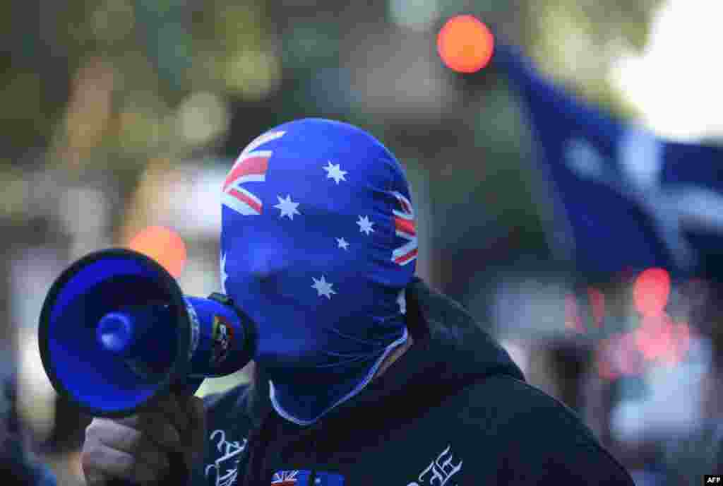 An anti-Muslim protester shouts slogans outside the Parramatta Mosque in Sydney, Australia.&nbsp; A small number of protesters gathered outside the mosque, which was regularly attended by 15-year-old radicalized Farhad Jabar, who killed a police worker a week ago before dying in a gunbattle with police.