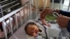 'I Am Truly Devastated': Volunteers Breastfeed Babies Left Motherless in Kabul Attack 