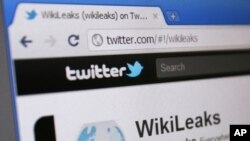 WikiLeaks' Twitter page is seen on a computer screen in Singapore. A U.S. court has ordered Twitter to hand over details of the accounts of WikiLeaks and several supporters as part of a criminal investigation into the release of hundreds of thousands of c