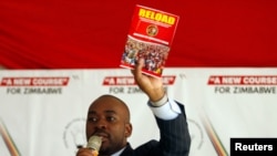 FILE - Opposition leader Nelson Chamisa gestures while addressing a rally of his Movement for Democratic Change (MDC) party in Harare, Zimbabwe, July 11, 2019. 