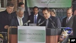 A group of Jewish, Christian and Muslim religious leaders protest proposed cuts to a government food subsidy program for tens of millions of Americans, in Washington, D.C., October 28, 2011.