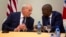 U.S. Homeland Security Secretary John Kelly, left, talks to Haiti's President Jovenel Moise during a news conference at the National Palace in Port-au-Prince, May 31, 2017. 