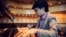 Joey Alexander checks out a piano at Dizzy’s Club Coca Cola, a jazz club at Jazz at New York City's Lincoln Center. (Courtesy - ShoreFire Media)