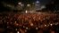 FILE - Candles flicker in Hong Kong's Victoria Park during a June 4, 2009, vigil to remember the crackdown on the pro-democracy movement in Beijing's Tiananmen Square. 