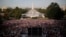 People pack the West Lawn of the U.S. Capitol to see Pope Francis appear on the Speaker's balcony during his speech to the U.S. Congress in Washington, Sept. 24 2015. 