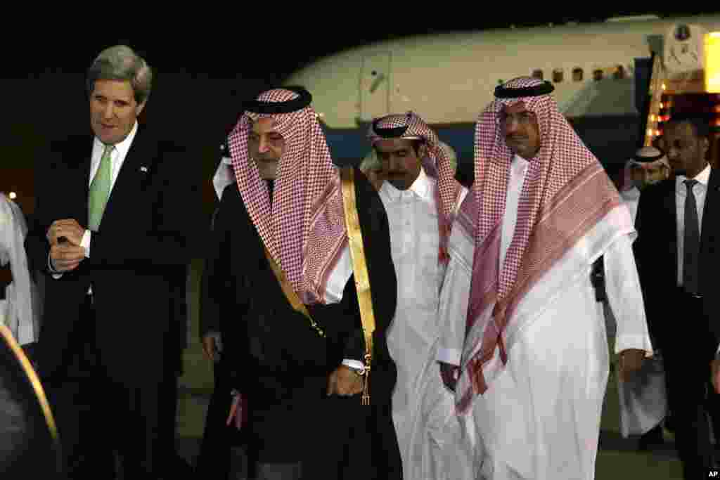 U.S. Secretary of State John Kerry walks with Saudi Foreign Minister Prince Saud al-Faisal on arrival in Riyadh, Saudi Arabia, March 3, 2013.