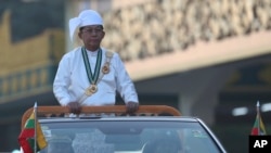 Myanmar's Senior Gen. Min Aung Hlaing, head of the military council, inspects officers during a ceremony marking the 75th anniversary of Independence Day in Naypyitaw, Jan. 4, 2023. 