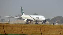 FILE - A Pakistan International Airline (PIA) plane taxis on the runway on the way to Saudi Arabia, Feb. 8, 2016.