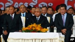 From left: Cambodian National Assembly President Heng Samrin, Senate President Chea Sim, Prime Minister Hun Sen, attend ceremony, Phnom Penh, Jan. 7, 2014.