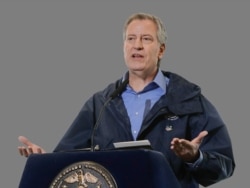 FILE - New York City Mayor Bill de Blasio: "We will get through this crisis."
