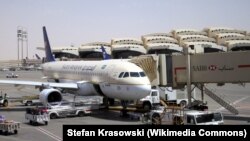 A Saudi Arabian Airlines A320 is parked at the King Khalid International Airport, Riyadh, Saudi Arabia. The Saudi military intercepted a ballistic missile fired from Yemen, Nov. 3, 2017, aimed at the airport. 