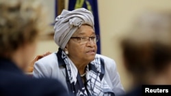 FILE - Then-President Ellen Johnson Sirleaf attends a news conference at the Presidential Palace in Monrovia, Liberia, Oct. 12, 2017. 