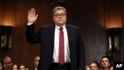 FILE - Attorney General William Barr is sworn in to testify before the Senate Judiciary Committee hearing on Capitol Hill in Washington, May 1, 2019, on the Mueller Report.