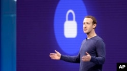 FILE- Facebook CEO Mark Zuckerberg is seen during a keynote speech in San Jose, California.
