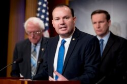 FILE - Sen. Mike Lee, R-Utah, speaks at a news conference on Capitol Hill in Washington, Jan. 30, 2019.