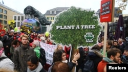 People march during a demonstration under the banner "Protect the climate - stop coal" two days before the start of the COP 23 UN Climate Change Conference in Bonn, Germany, Nov. 4, 2017.