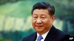 Chinese President Xi Jinping meets Britain's Prince Andrew at the Great Hall of the People in Beijing, May 29, 2018.