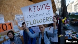 People march on the street to mark the International Women's Day in Tbilisi, Georgia, March 8, 2016. 