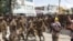 Ethiopian government soldiers and prisoners of war in military uniforms walk through the streets of Mekelle, the capital of Tigray region, Ethiopia, July 2, 2021. 