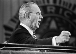 FILE - U.S. President Lyndon Johnson speaks at the national convention of the American Legion, Sept. 11, 1968.