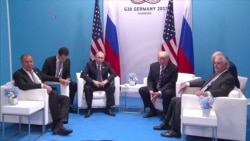 Trump, Putin Appear to Enjoy First Meeting as G-20 Protests Flare