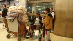 Rights Groups Promise Fast Action to Block New Travel Ban