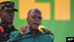 FILE - Tanzania's President John Magufuli speaks at the Jamhuri Stadium in Dodoma, Tanzania, Aug. 29, 2020.
