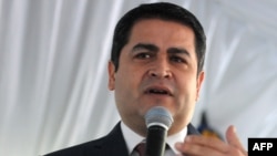 FILE - Honduran President Juan Orlando Hernandez