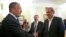 Russian Foreign Minister Sergei Lavrov, left, greets Syrian Deputy Prime Minister Qadri Jamil, right, in Moscow, Russia, July 22, 2013.
