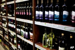 Wine bottles manufactured in a Jewish settlement in the West Bank on display at a supermarket in Jerusalem Wednesday, Nov. 11, 2015.