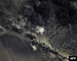 A video grab from Sept. 30, 2015, shows an image taken from footage made available on the Russian Defense Ministry's official website, purporting to show an airstrike in Syria.