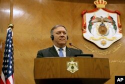U.S. Secretary of State Mike Pompeo listens at a news conference with Jordanian Foreign Minister Ayman Safadi in Amman, Jordan, April 30, 2018.
