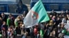 Protest in Algiers - Weekly Demo - flag carrying protesters - manifestants du mouvement Hirak