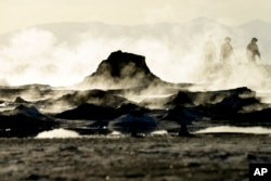 Steam rises from geothermal mud pots near the banks of the Salton Sea near Niland, California, April 29, 2015, evidence of the region's vast geothermal activity.