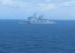 FILE - This undated file photo released on Sept. 15, 2020, by Indonesian Maritime Security Agency (BAKAMLA) shows a Chinese Cost Guard ship sails in North Natuna Sea.