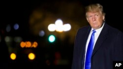 FILE - President Donald Trump walks on the South Lawn of the White House after stepping off Marine One in Washington, April 6, 2019. 