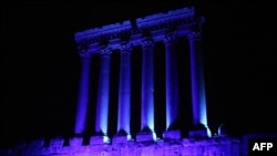 FILE - Part of the temples of Baalbek, a UNESCO world heritage site in Lebanon's eastern Bekaa Valley, illuminated in blue light, Oct. 24, 2015. 