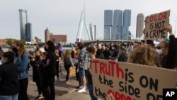 People take part in a demonstration in Rotterdam, Netherlands, June 3, 2020, to protest against the death of George Floyd, police violence and institutionalized racism.