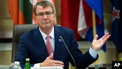 U.S. Defense Secretary Ash Carter opens the Global Coalition to Counter IS Meeting at Joint Base Andrews, Maryland, outside of Washington, D.C., July 20, 2016.