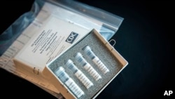 This undated photo provided by U.S. Centers for Disease Control and Prevention shows CDC’s laboratory test kit for the new coronavirus. 