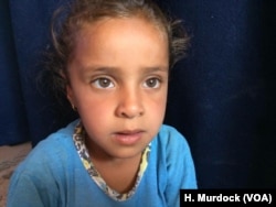 After losing two children in the war with Islamic State, Zamin and Ibrahim Makhool's only remaining daughter, Amani, speaks of her old home fondly while living in a desert refugee camp outside Mosul. "It was perfect," she says. "I want to go home," in Hammam Alil, Iraq on June 21, 2017.