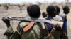 A South Sudanese soldier holds his rifle. Civilians own most of the small arms in South Sudan. (Reuters/File)