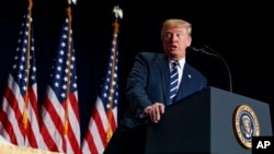 President Donald Trump speaks during the National Prayer Breakfast, Feb. 8, 2018, in Washington. 