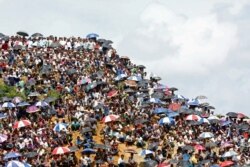 FILE - Rohingya refugees gather to mark the second anniversary of the exodus at the Kutupalong camp in Cox’s Bazar, Bangladesh, August 25, 2019.