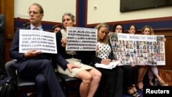  People who lost loved ones in Lion Air flight JT610 and Ethiopian Airlines flight ET302 crashes attend a House Transportation and Infrastructure Aviation Subcommittee hearing on the Boeing 737 MAX, Capitol Hill, Washington, June 19, 2019. 